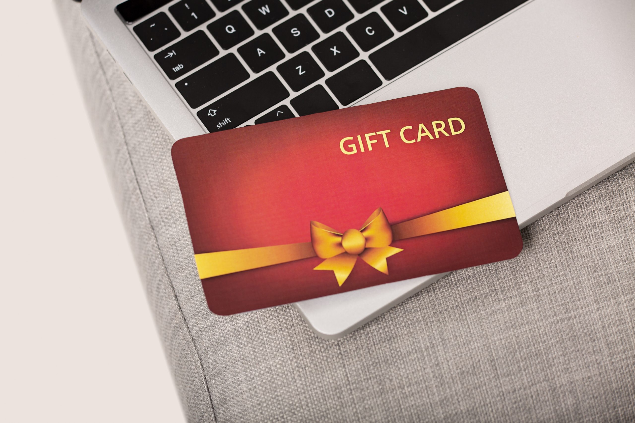 Top 5 Most Valuable Gift Cards in 2024: What You Should Be Trading beautiful gift voucher with hand